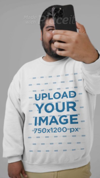 Gildan Sweatshirt Video Featuring a Happy Man Taking a Selfie in a Studio 8874v