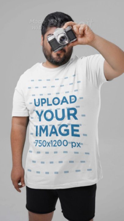 Bella Canvas T-Shirt Video Featuring a Man Covering His Face With a Vintage Camera 8871v