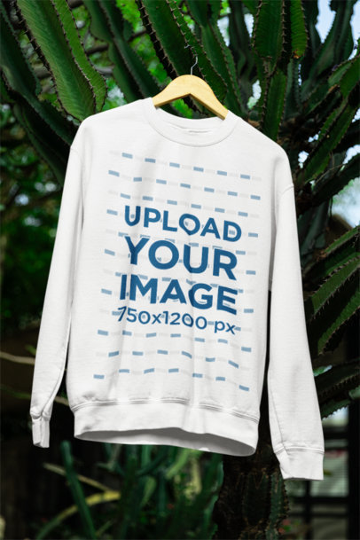 Mockup of a Gildan Sweatshirt Hanging in a Nature Setting m39854