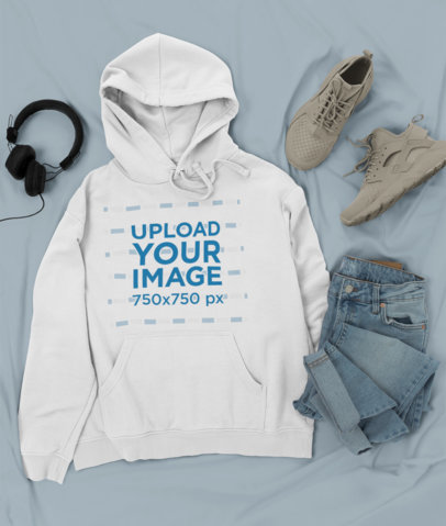 Outfit Mockup Featuring a Pullover Hoodie Next to Trendy Sneakers and Jeans