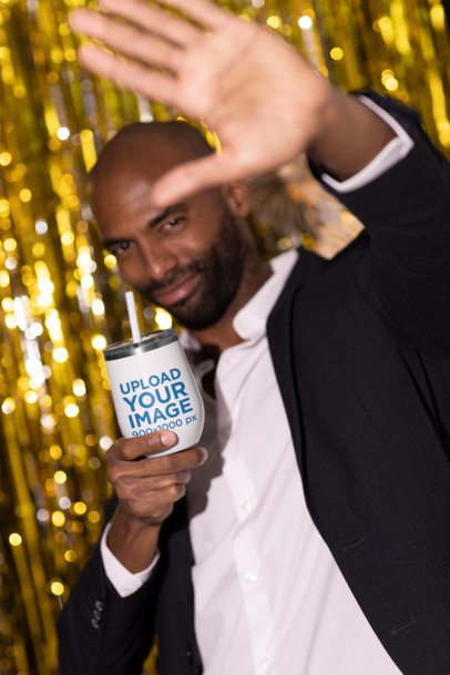 New Year-Themed Mockup of a Bearded Man Holding a Wine Tumbler